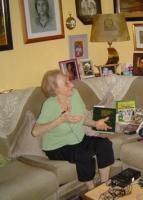 A lady being interviewed in her home